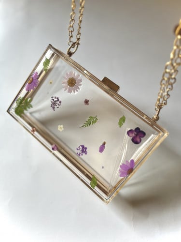 حقيبة بالزهر البنفسجي