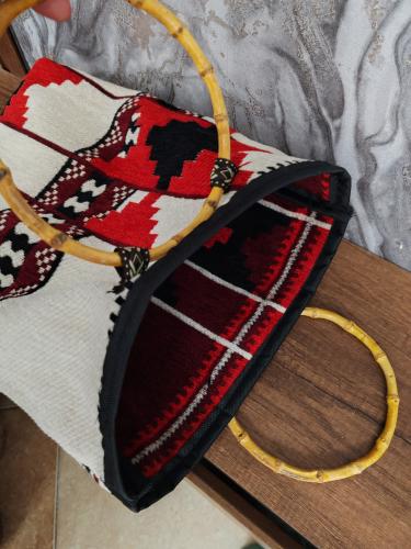 One handbag with (first one) and one shoulder bag