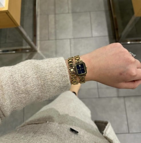 ساعة tory burch
