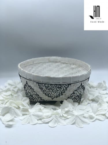 سلة من الخوص الطبيعي ( عرض25 سم ) مرسوم عليها رسم يدوي