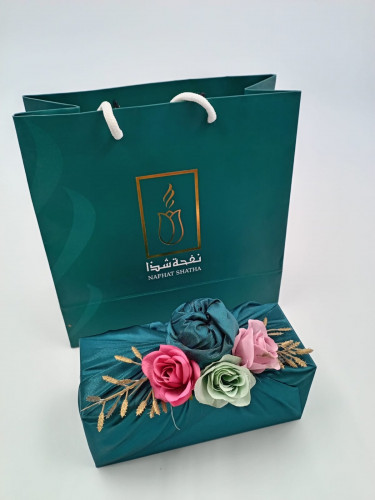 عطر يقدم هدية شامل التغليف