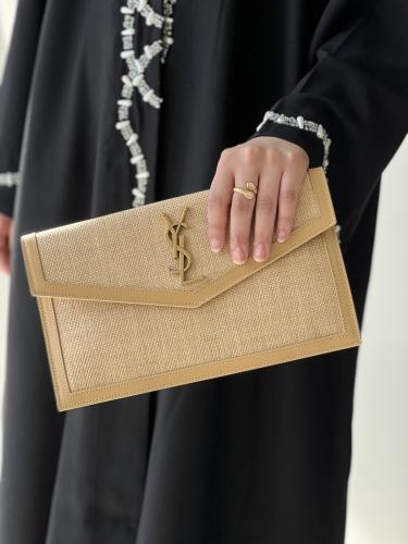 سان لوران | UPTOWN POUCH IN CANVAS AND SMOOTH LEAT...