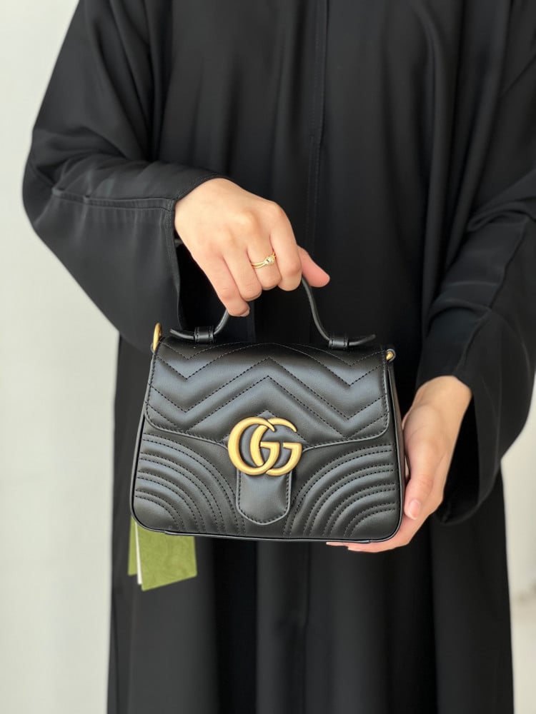 قوتشي |    GG Marmont handle bag
