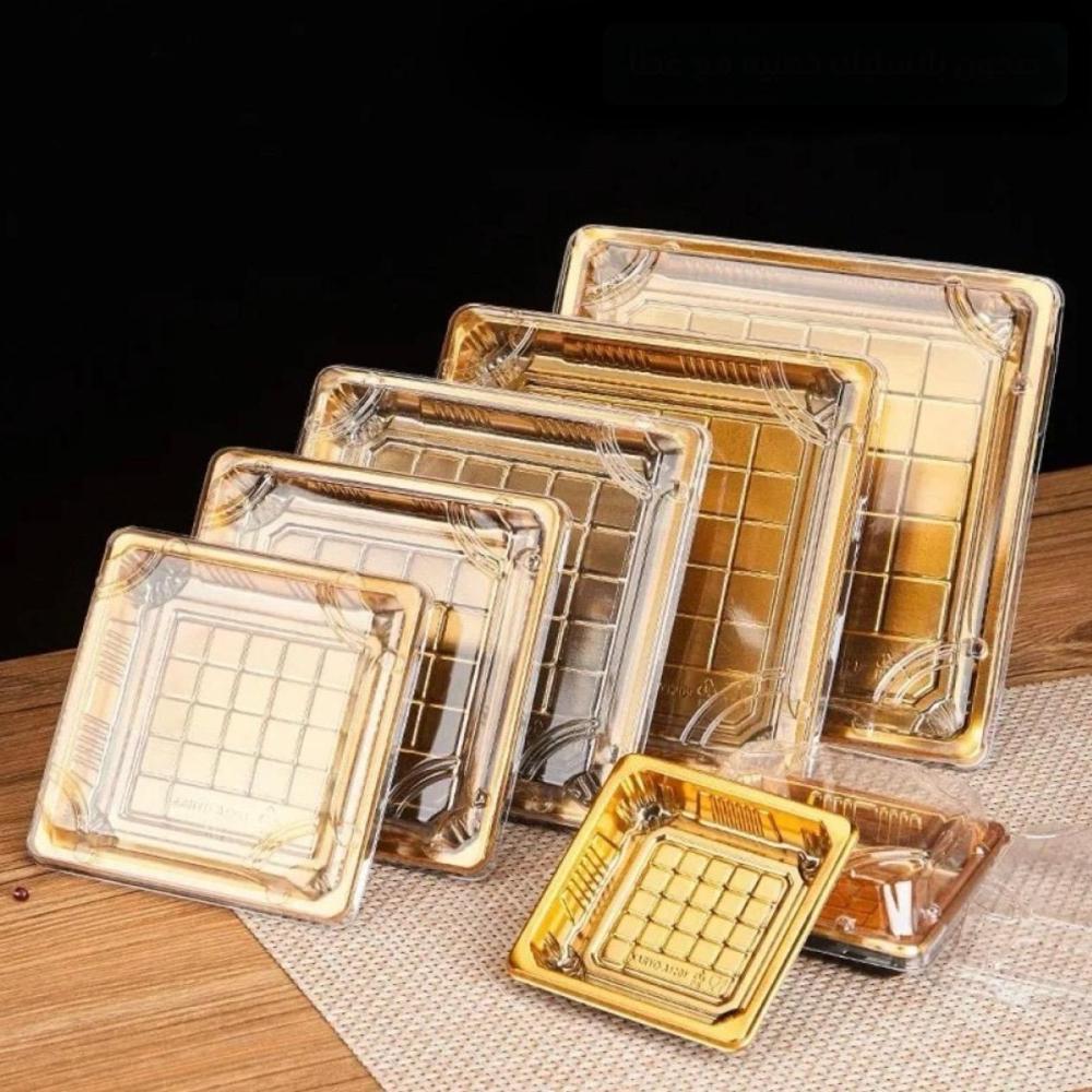 صحون بلاستيكية فاخرة بقاعدة ذهبية مع غطاء شفاف