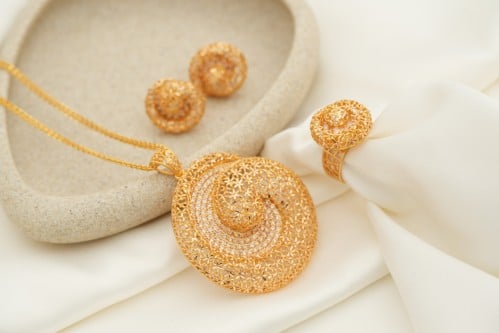 نص طقم عيار 21