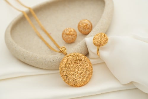 نص طقم عيار 21