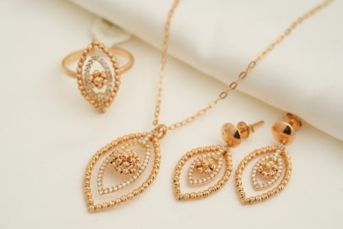 نص طقم عيار 21