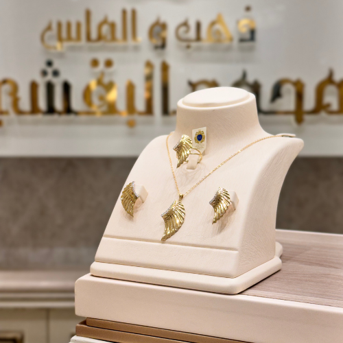 نص طقم عيار 18