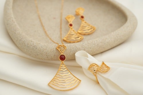 نص طقم عيار 21