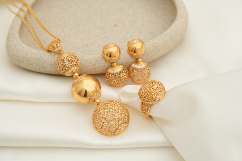 نص طقم عيار 21