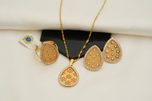 نص طقم عيار 21