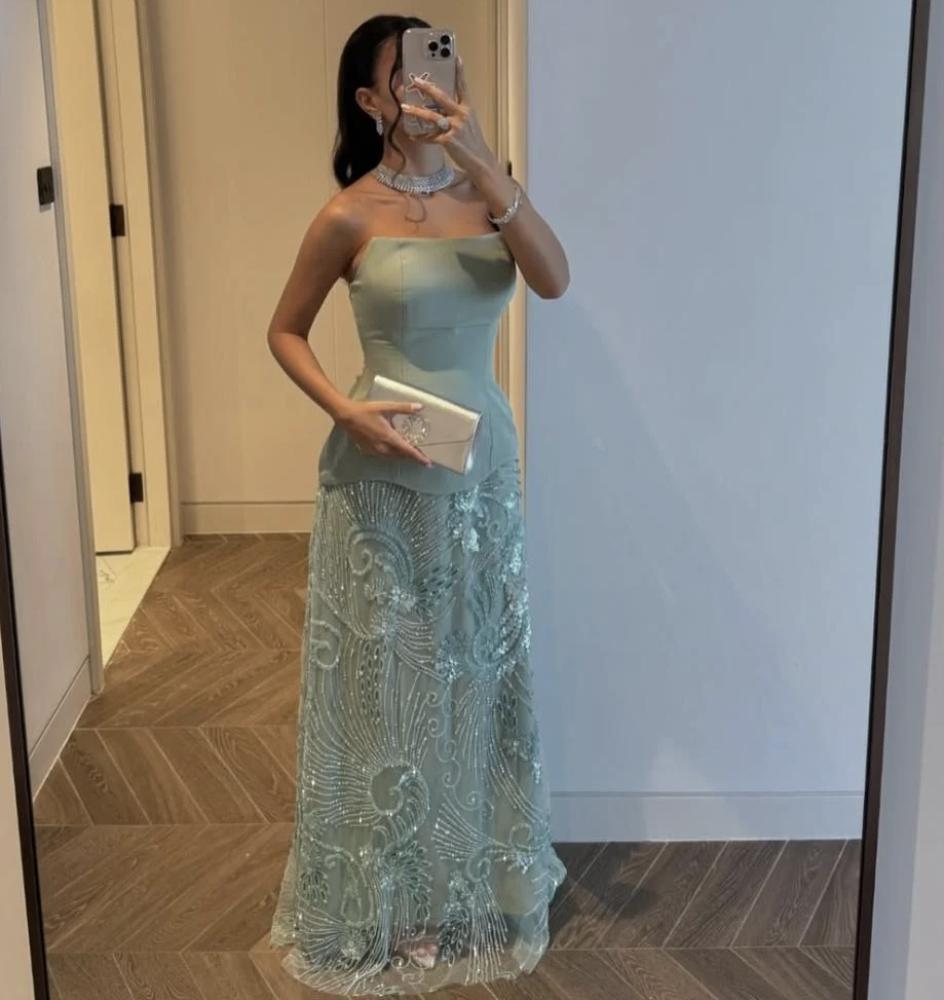 فستان باربي  انيق بلونه الفيروزي قماش باربي مع كلفة مطرزه مكس توب