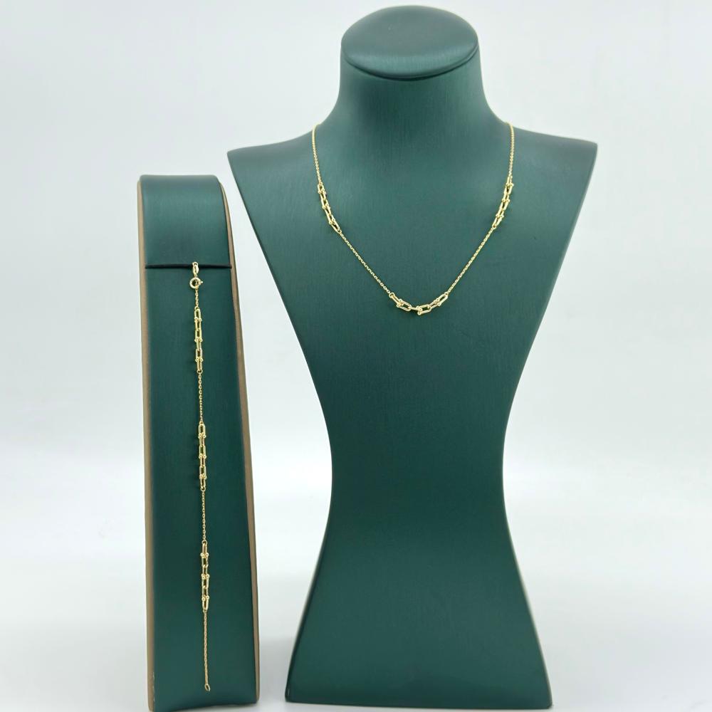 عقد و سوارة ذهب أصفر عيار 18 من مجوهرات الشلوي