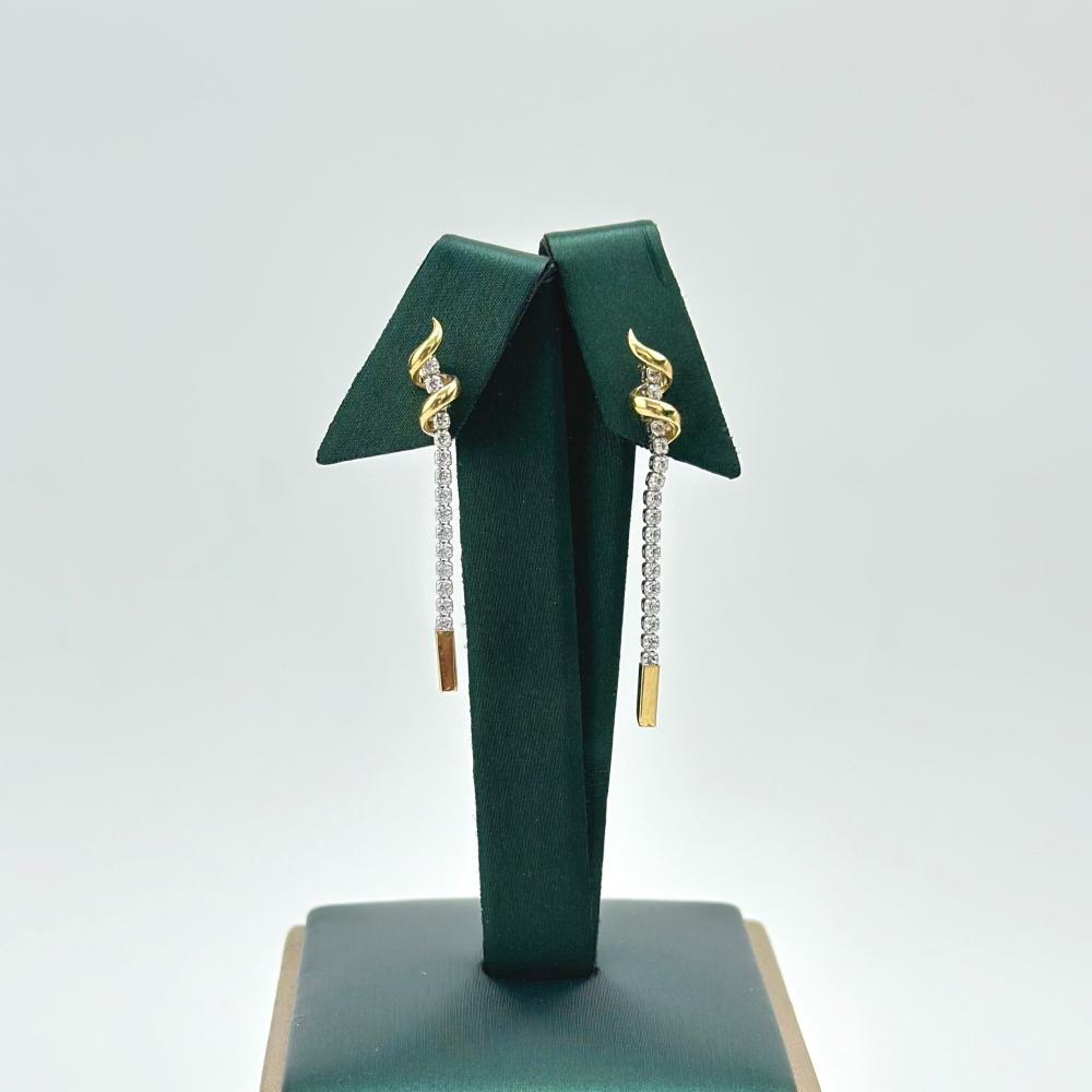 حلق تنس ذهب ابيض تصميم الماس عيار 18 من مجوهرات الشلوي