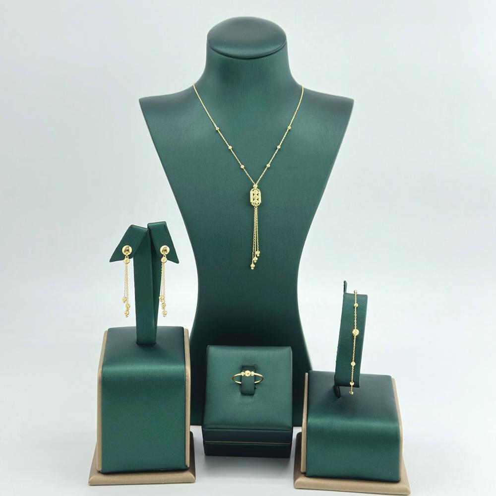 طقم ذهب اصفر عيار 18 من مجوهرات الشلوي