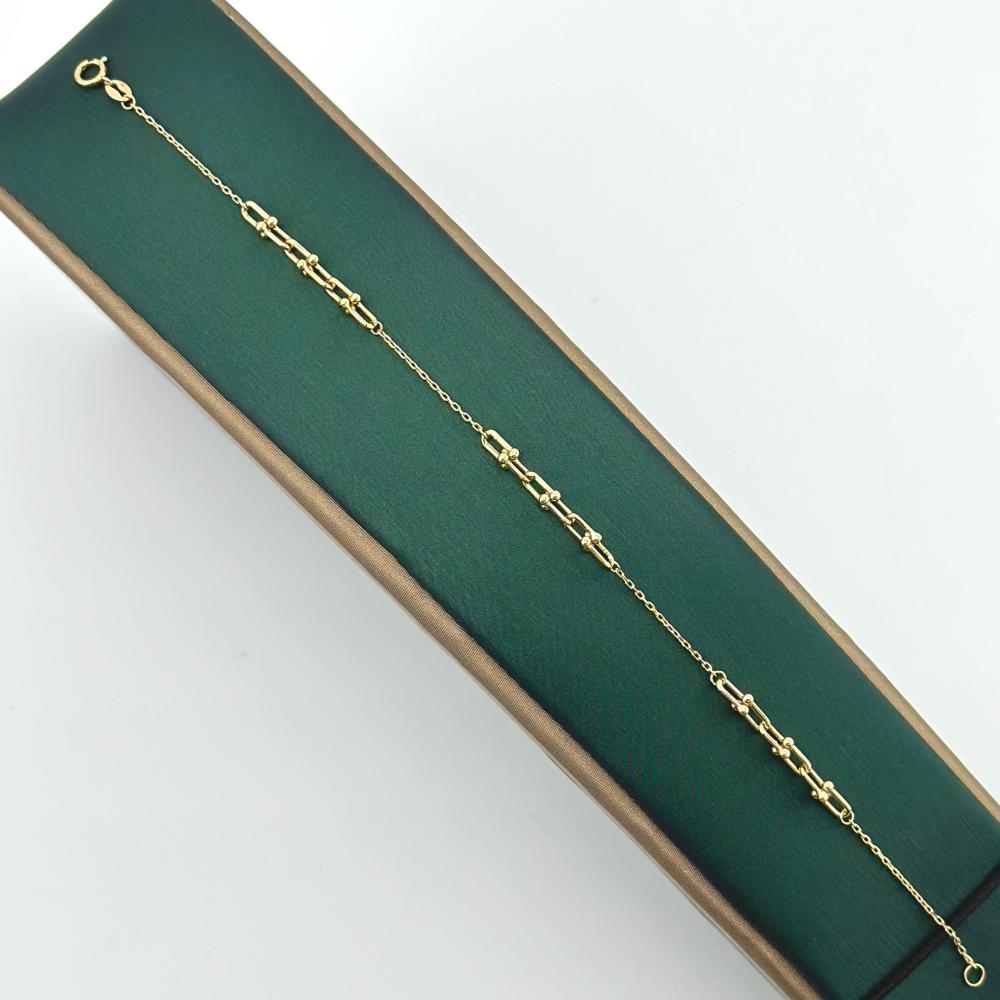 سوارة ذهب أصفر عيار 18 من مجوهرات الشلوي