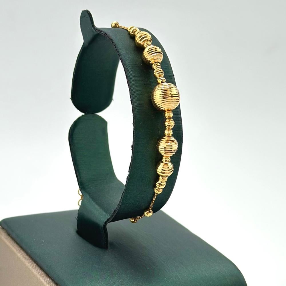 اسوارة ذهب ضمن طقم ذهب ناعم عيار 21 بتصميم كرات الليزر اللامعة