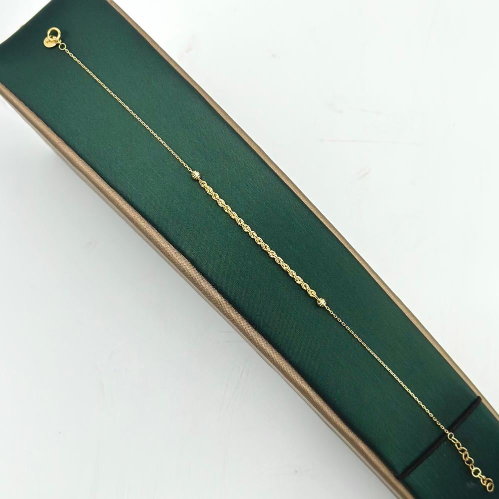 سوارة ذهب أصفر عيار 18 من مجوهرات الشلوي