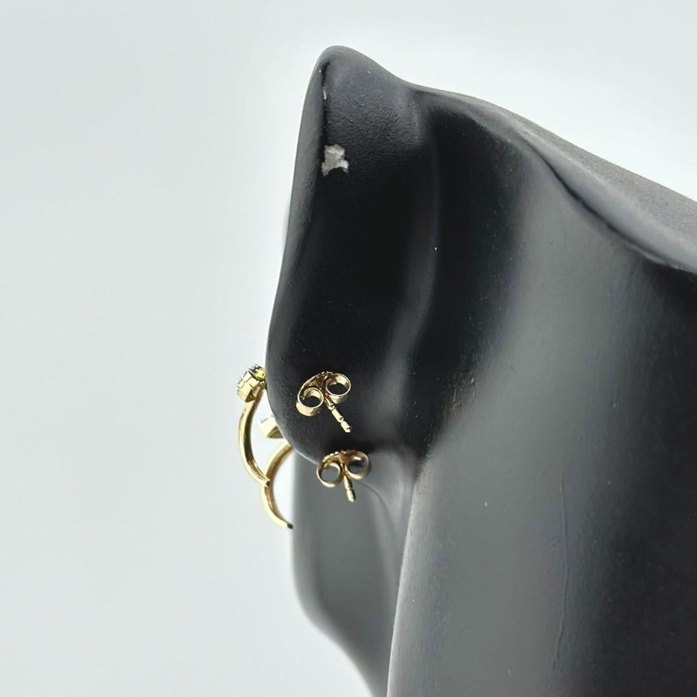 حلق ذهب أصفر تصميم ألماس عيار 18 من مجوهرات الشلوي