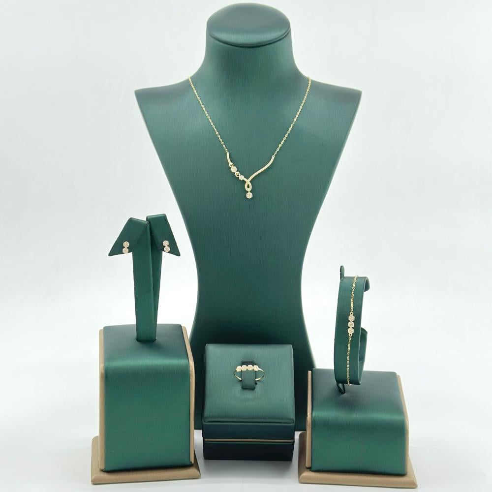 طقم ذهب أصفر عيار 18 من مجوهرات الشلوي