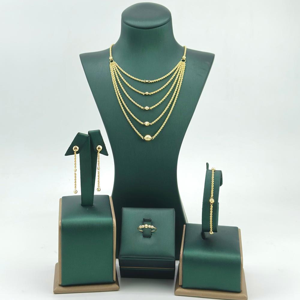 طقم ذهب أصفر عيار 18 من مجوهرات الشلوي