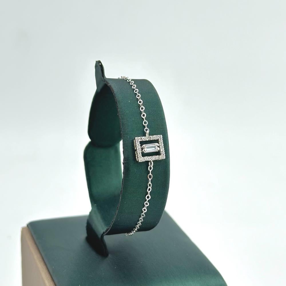 اسوارة ذهب ابيض تصميم الماس عيار 18 من مجوهرات الشلوي