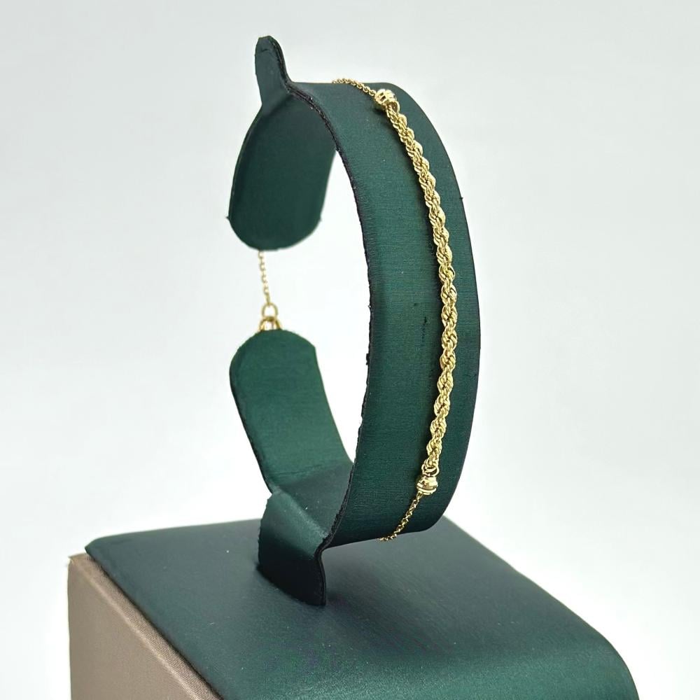 سوارة ذهب أصفر عيار 18 من مجوهرات الشلوي