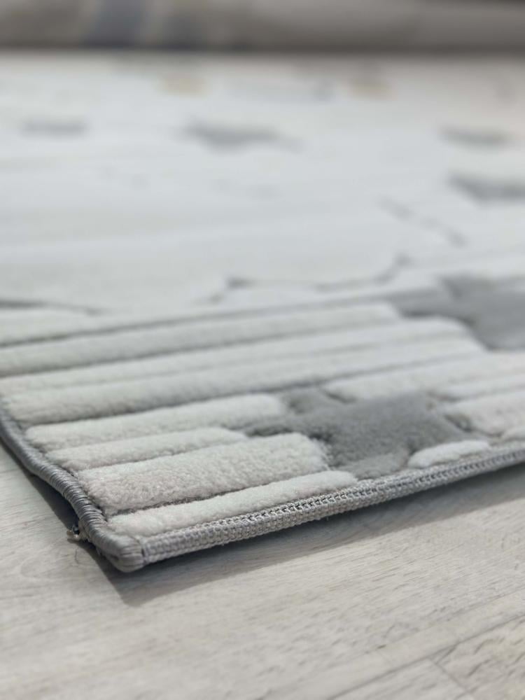 سجاد أطفال رمادي وكريمي