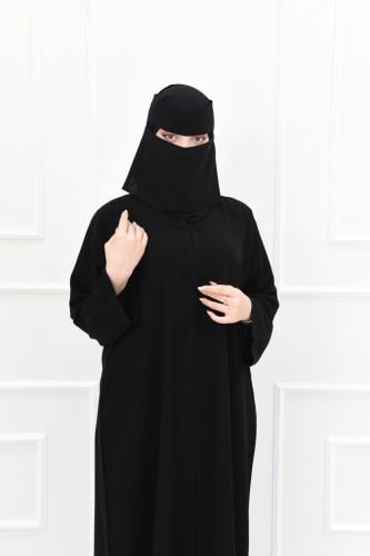 عباية سوداء سادة بأزرار قماشية أنيقة