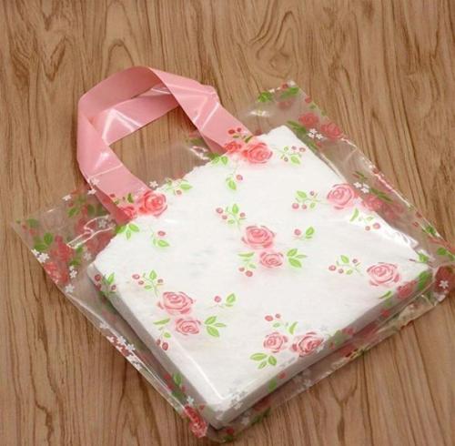 كيس هدايا شفاف مطبع بالورود