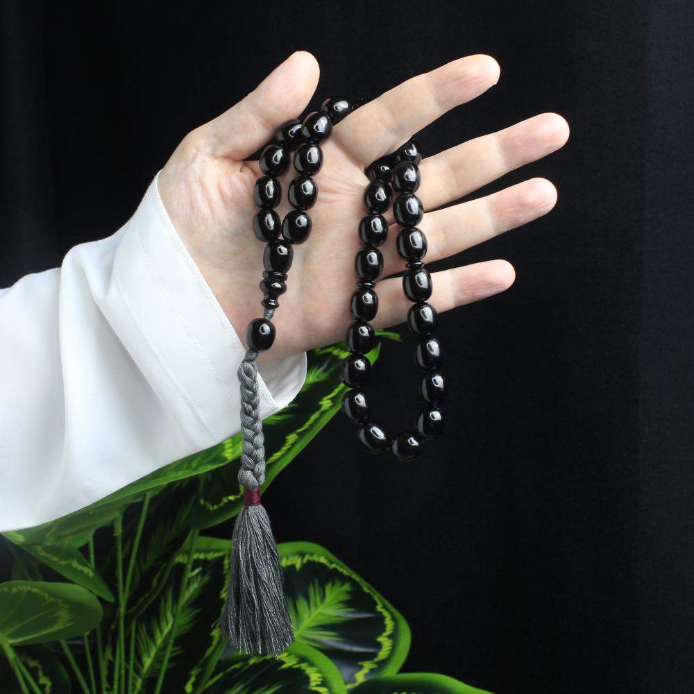 مسباح مسكي أسود كرزي بخرز بيضوي متوسط