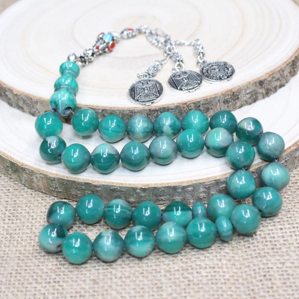 مسباح مسكي تركواز بتصميم كلاسيكي وحبات دائرية