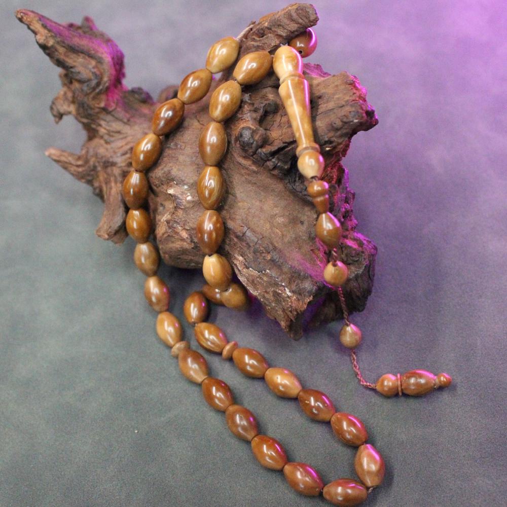 سبحة كوك طبيعي بحبات أسطوانية متوسطة وشرابة أنيقة