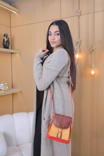 حقيبة بناتية جلد جمل طبيعي صناعية يدويه