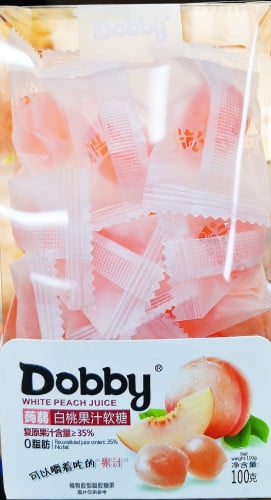 حلوى عصير الخوخ (نباتي 100% ) Real fruit juice peach candyDobby