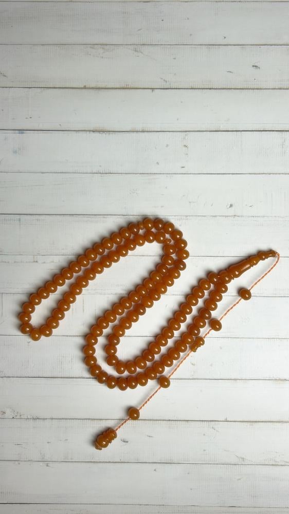 سبحة فاتوران لون كهرماني  ٩٩