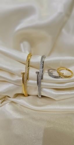 اسوارة مطلي ذهب مع خاتم تصميم ماركة كارتير