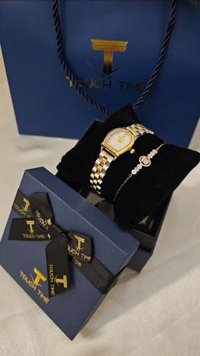 ساعة نسائي ماركة TOUOH TIME مع أساور مطلية ضد الماء ضمان سنة مع بوكس وكيس الماركة