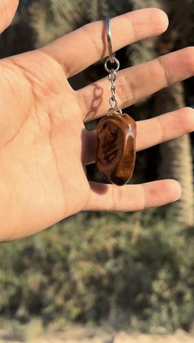 ميدالية على شكل تمر