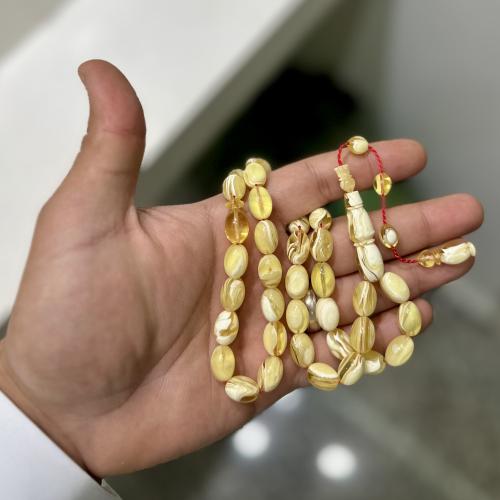 مسباح مستكه بريحه فواح شبيه الكهرب ( خيط أحمر )
