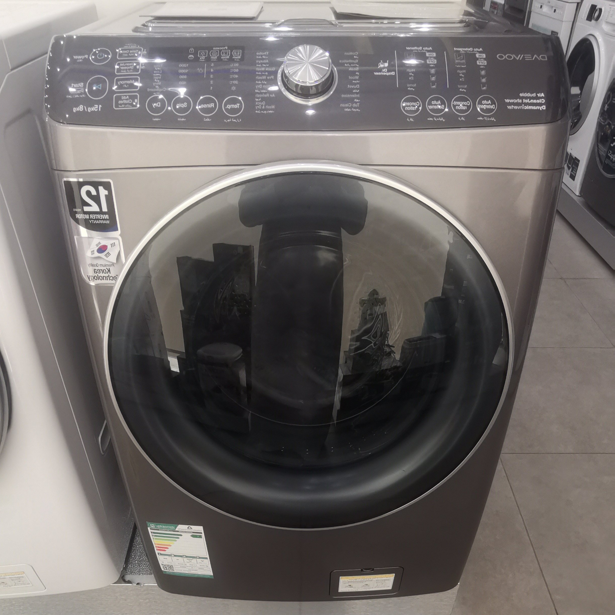 غسالة دايو تعبئة أمامية 15 كيلو – مجفف 8 كيلو – فضي