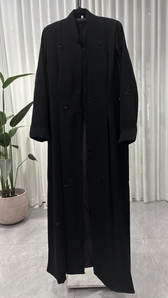 عباية -شك