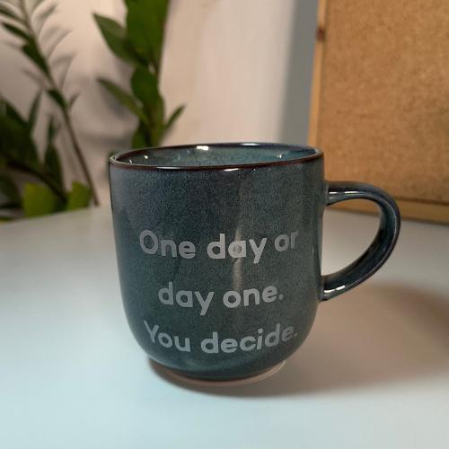 كوب بعباره " one day, or day one “