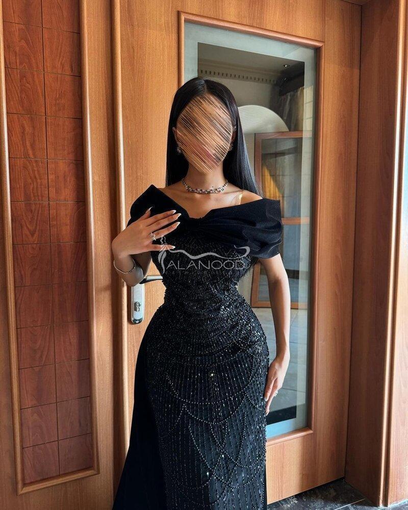 فستان لولوه سهرة بلون كحلي وأسود