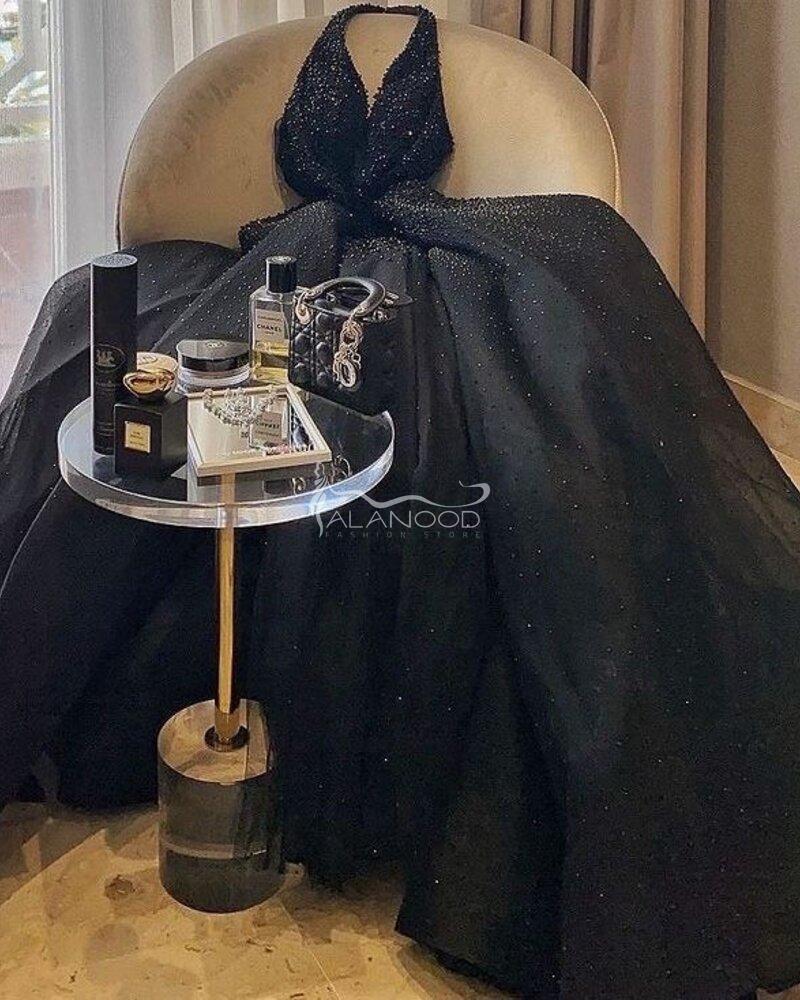 فستان سهرة مرصع باللول