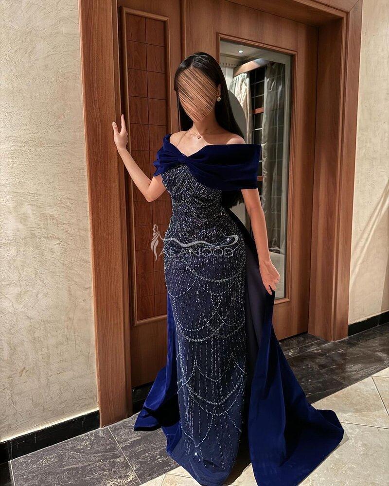 فستان لولوه سهرة بلون كحلي وأسود
