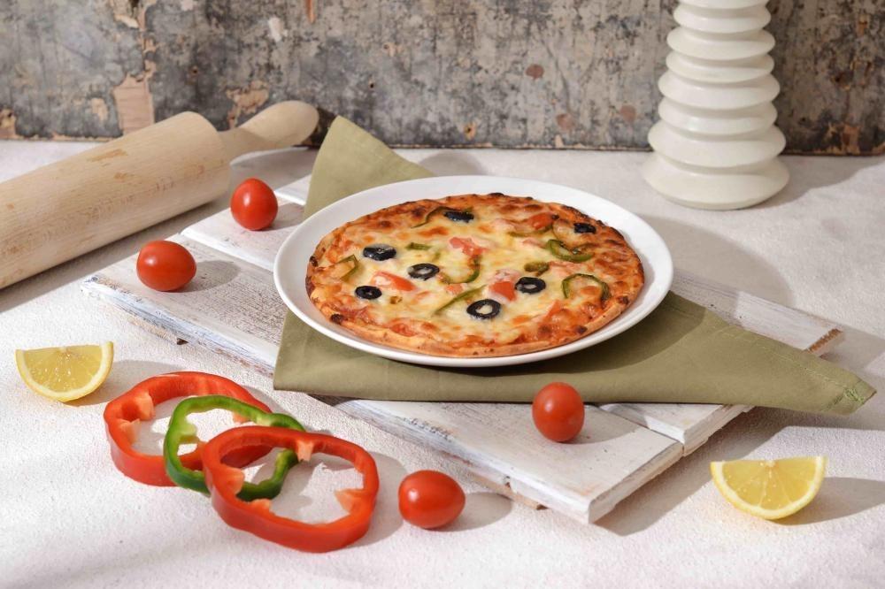 البيتزا المجمدة أم الطازجة