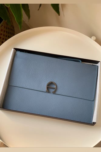 Etienne Aigner سماوي