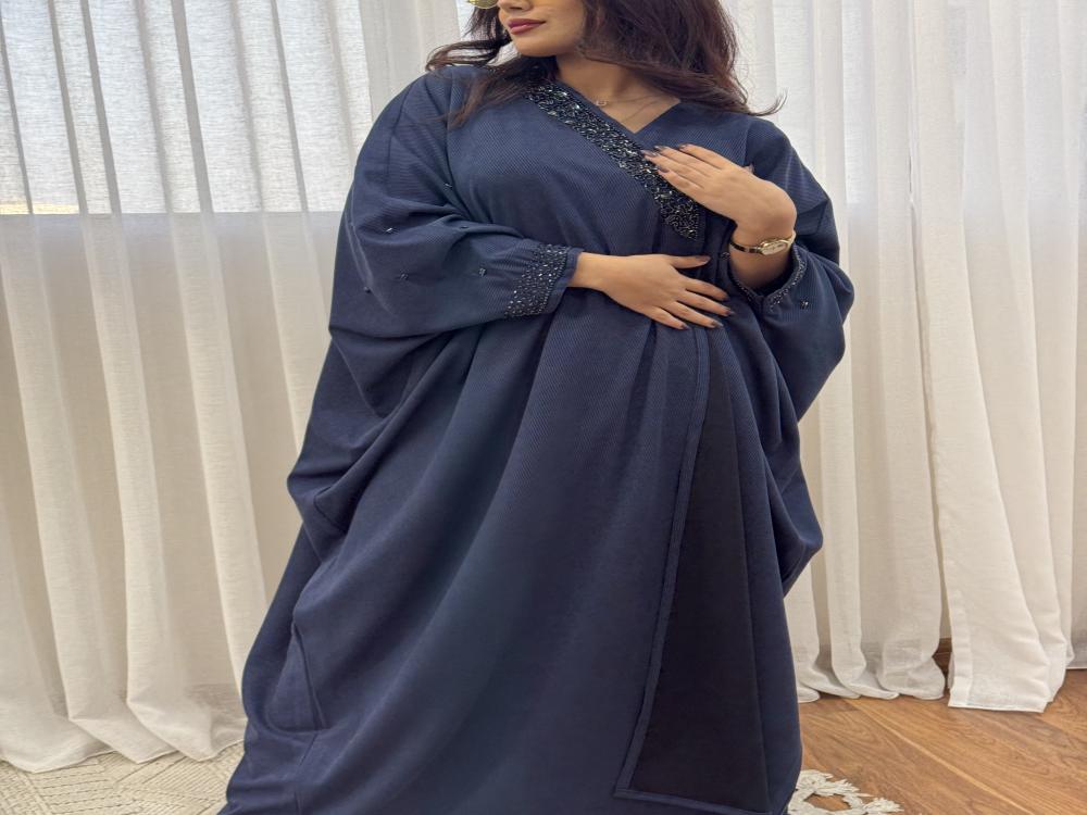 بشت شتوي نسائي مقلم خرز لون كحلي