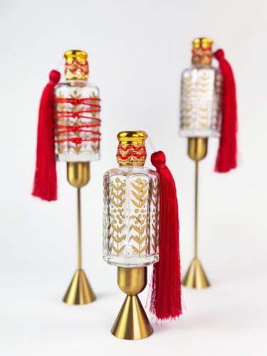 عبوة عطر أحمر